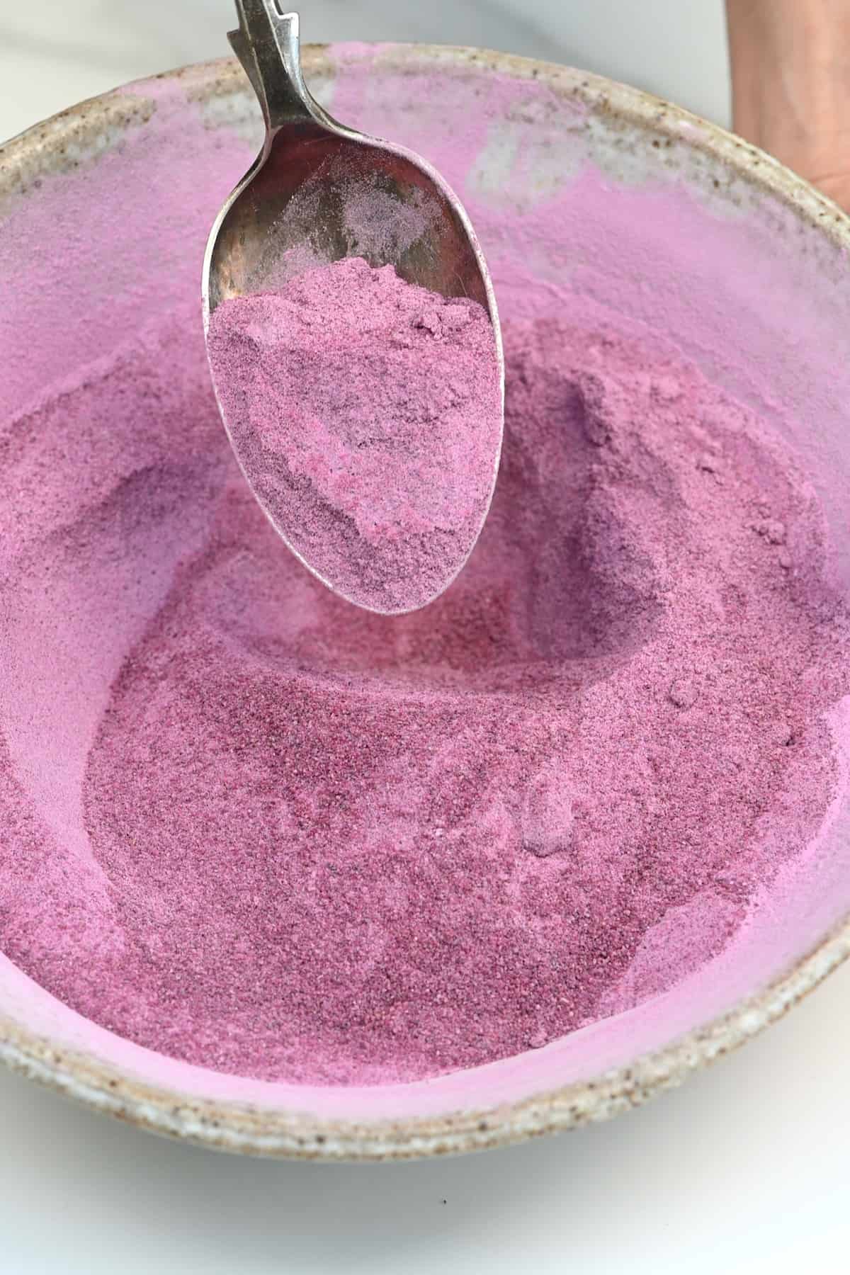 A spoonful of purple potato powder