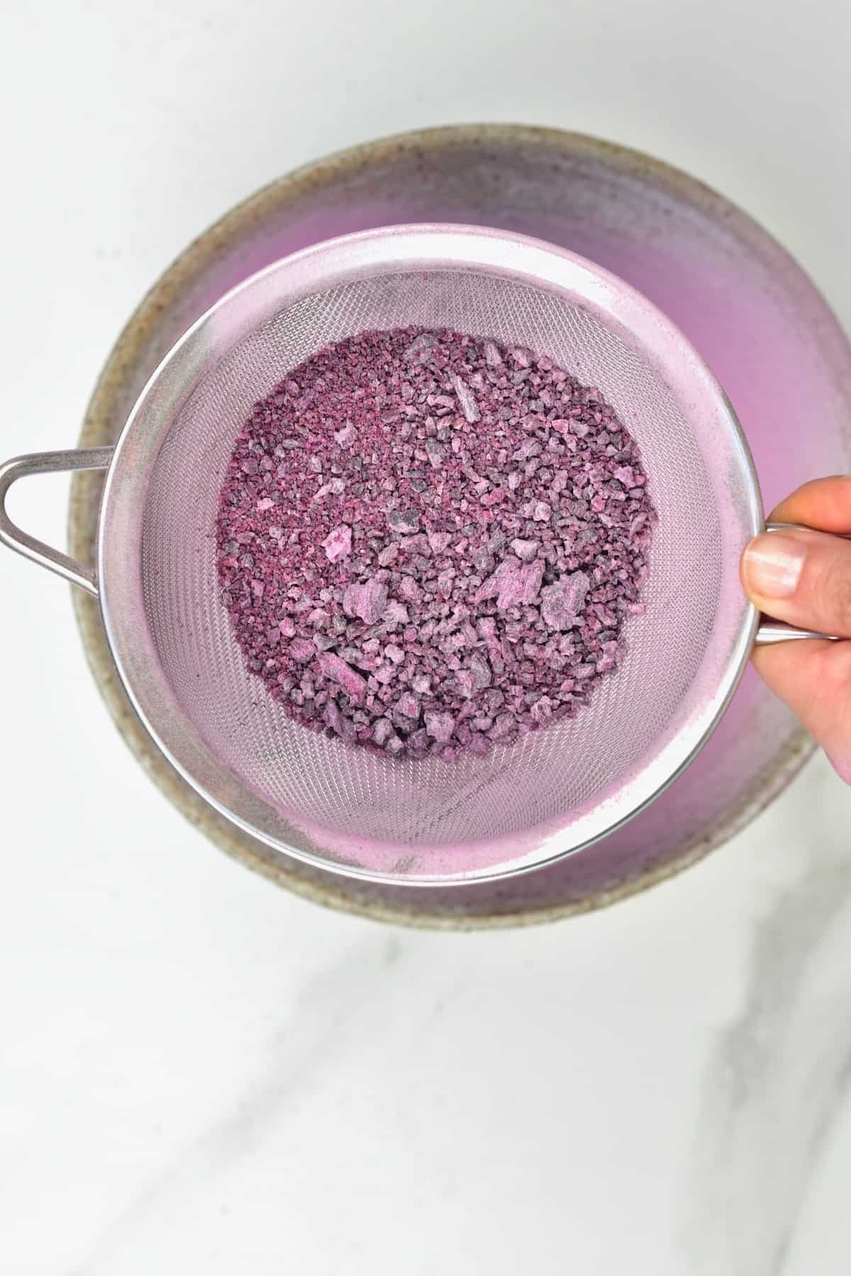 Sieving purple potato powder