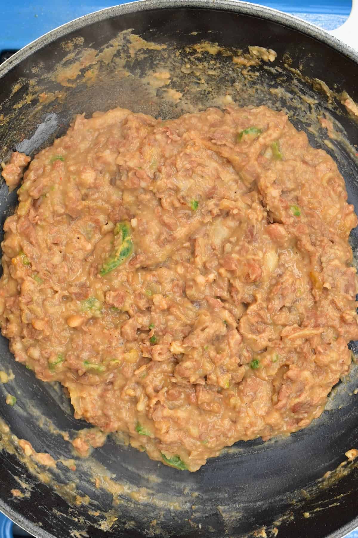 Vegan refried beans in a pan (frijoles refritos)