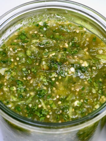 A jar with salsa verde