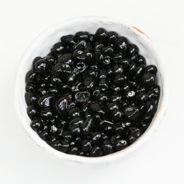A little bowl with vegan balsamic caviar