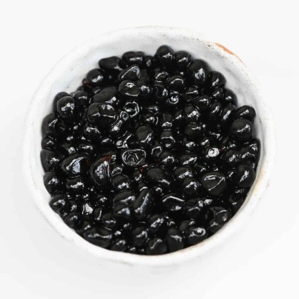 A little bowl with vegan balsamic caviar