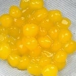 Mango tapioca pearls in a colander