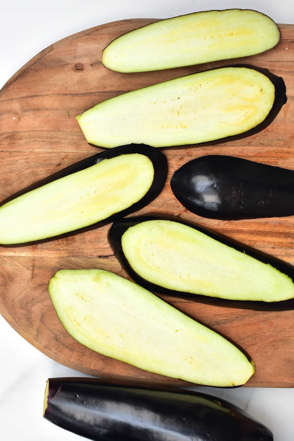Cut eggplant on a wooden board