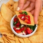 Tortilla chip topped with pico de gallo