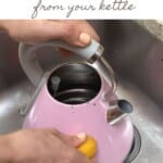 Cleaning a kettle with lemon