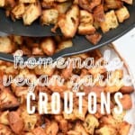 Placing homemade croutons in a bowl