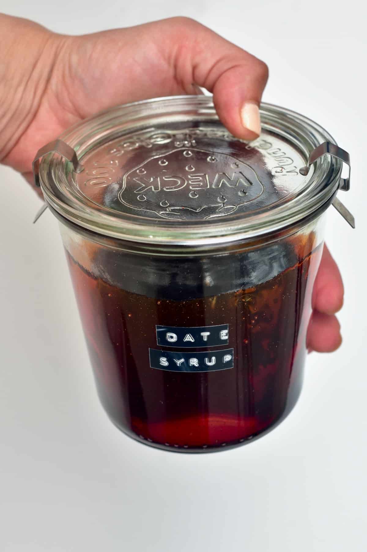 A jar with date syrup