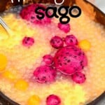 Mango sago dessert topped with mango and dragon fruit balls