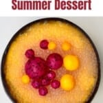 Mango sago dessert topped with mango and dragon fruit balls