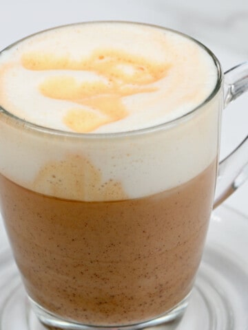 Mushroom latte in a glass mug
