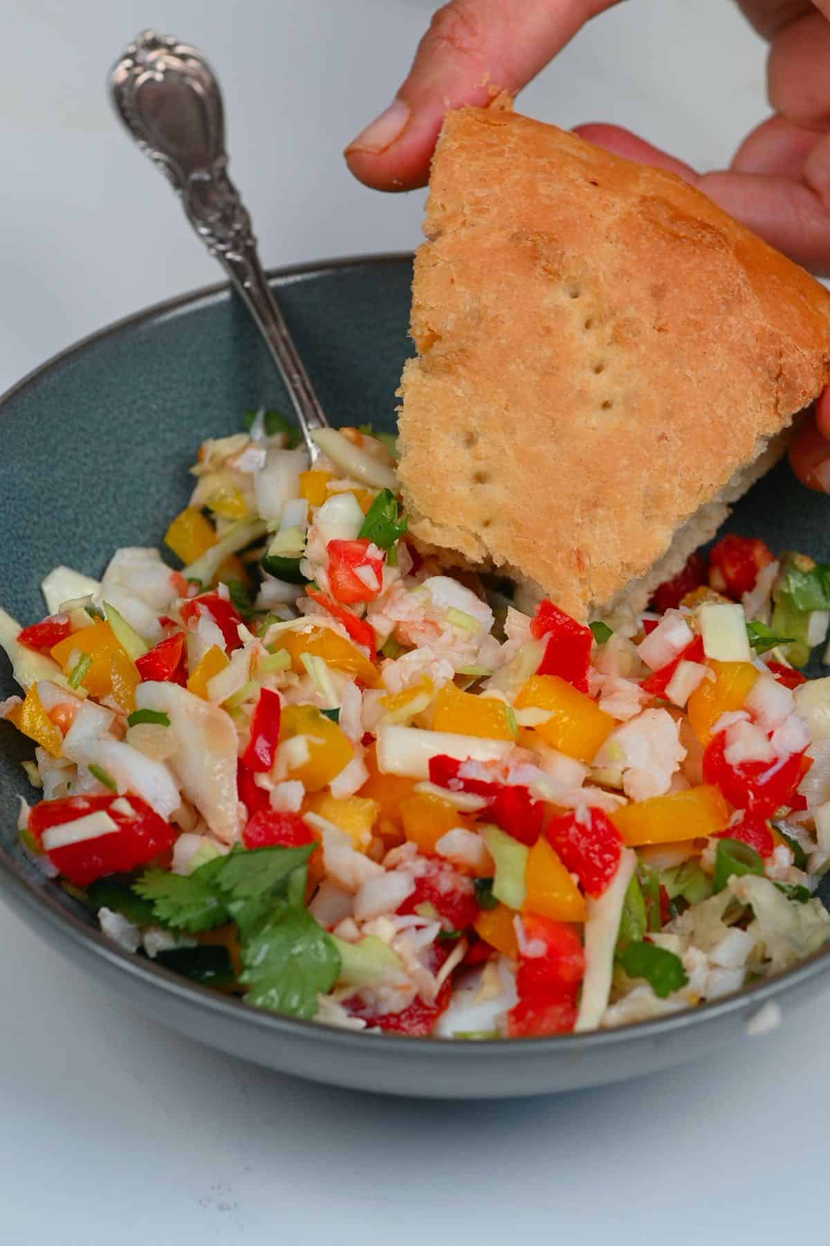 Salted cod salad and a piece of coconut bake