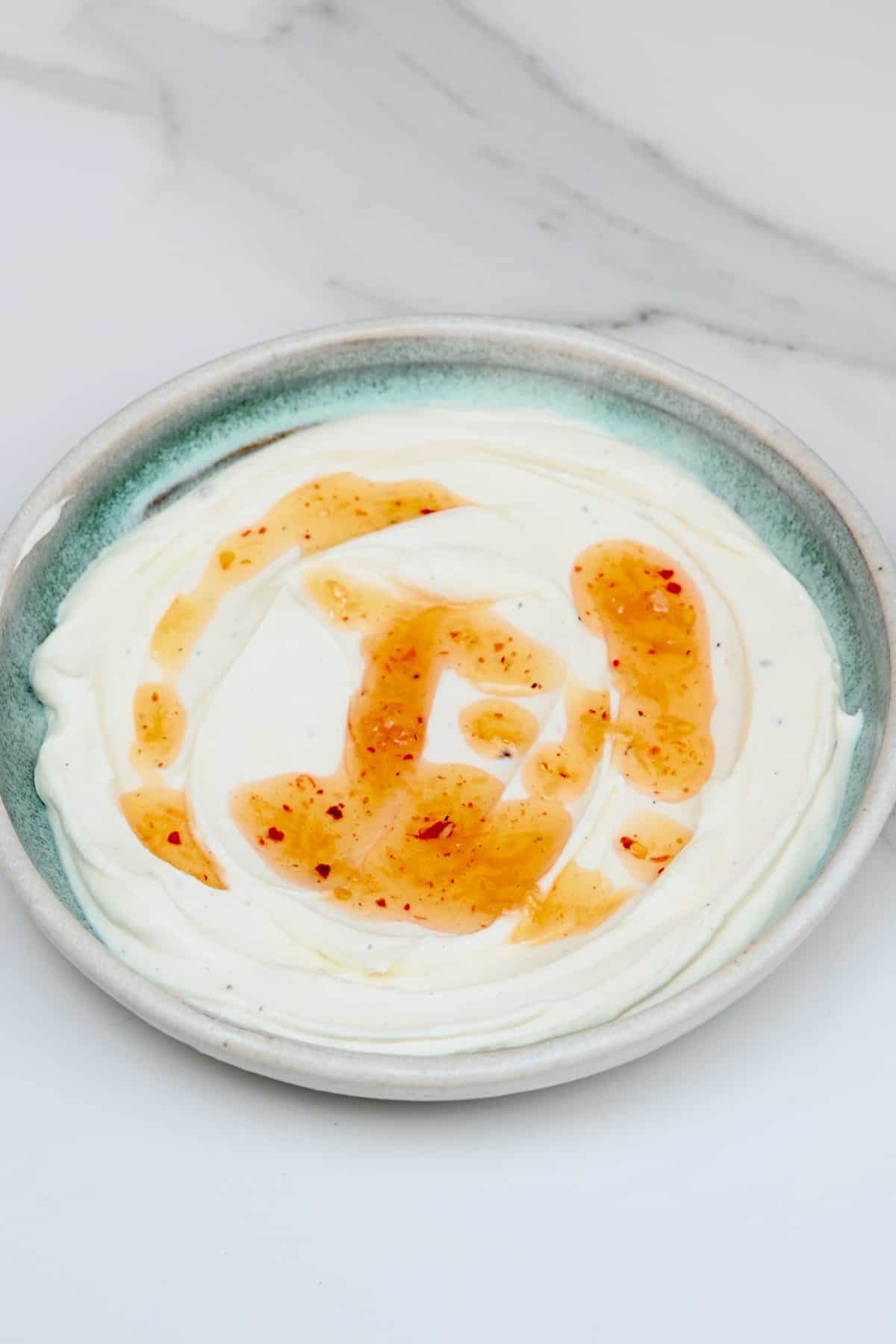 Whipped cheese topped with chili honey