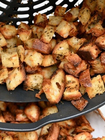 Homemade croutons in a pan