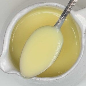 A spoonful of homemade condensed milk