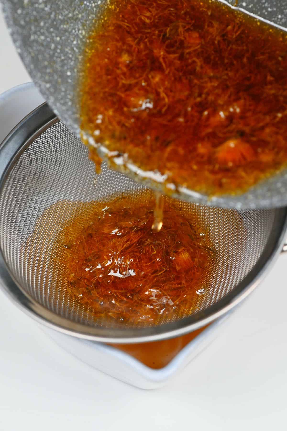 Sieving dandelion syrup