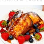 A plate with berries and french toast