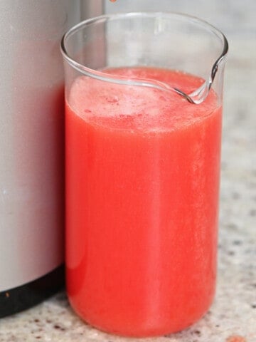 Tomato juice in a small pitcher