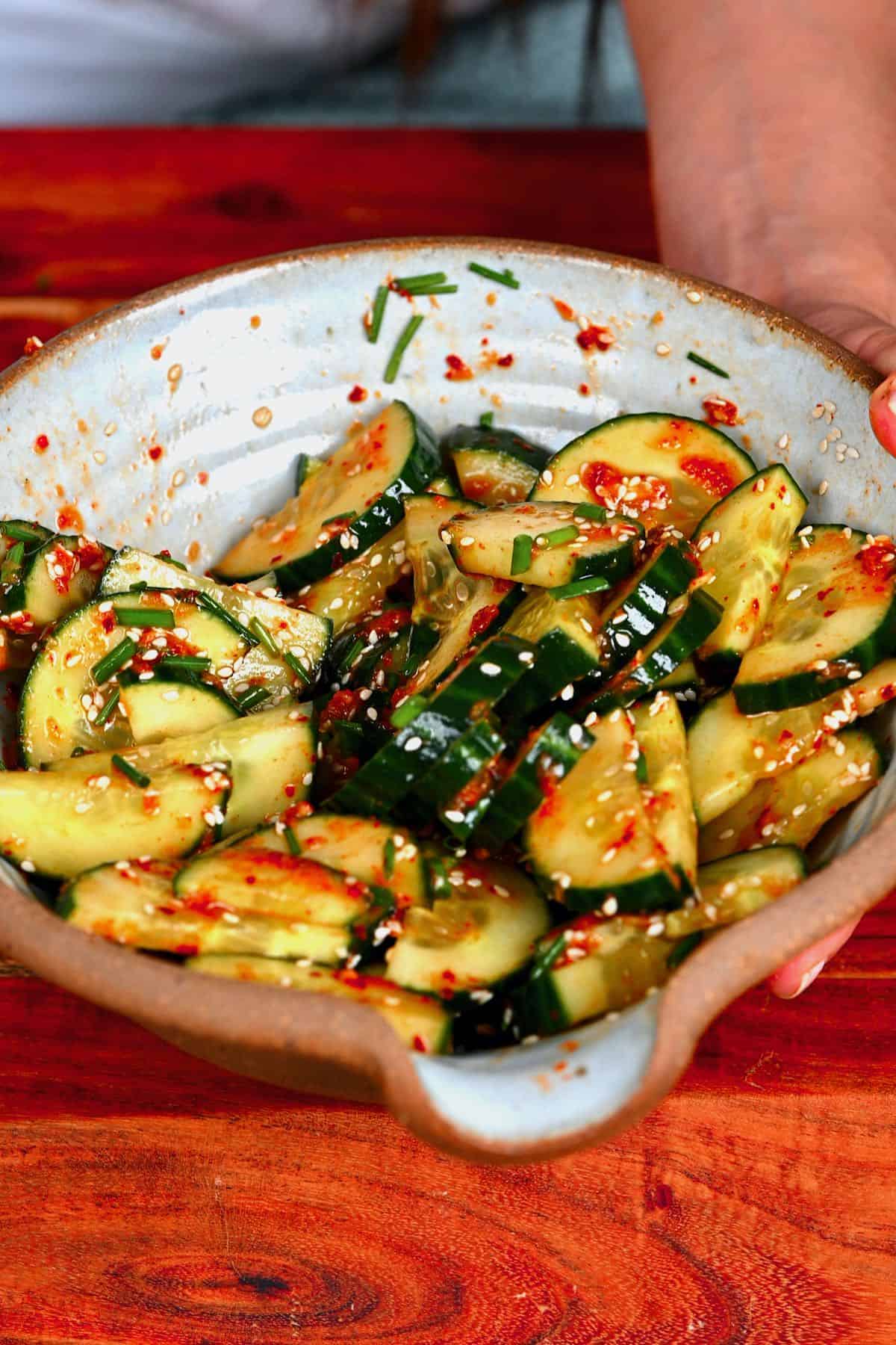 A bowl with Korean cucumber salad