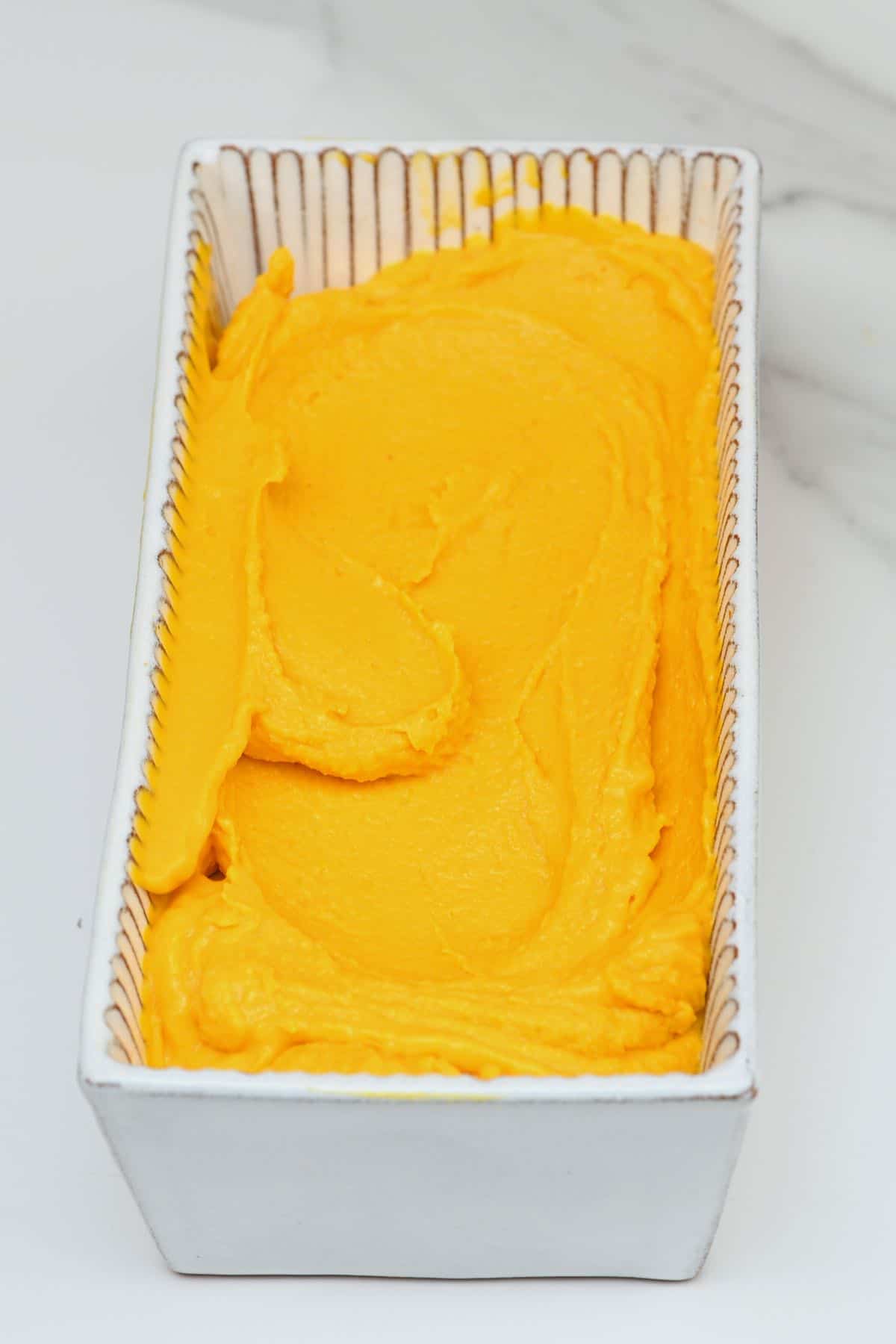Mango ice cream in a tin