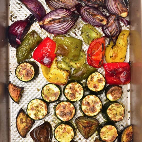 A baking tray with roasted veggies
