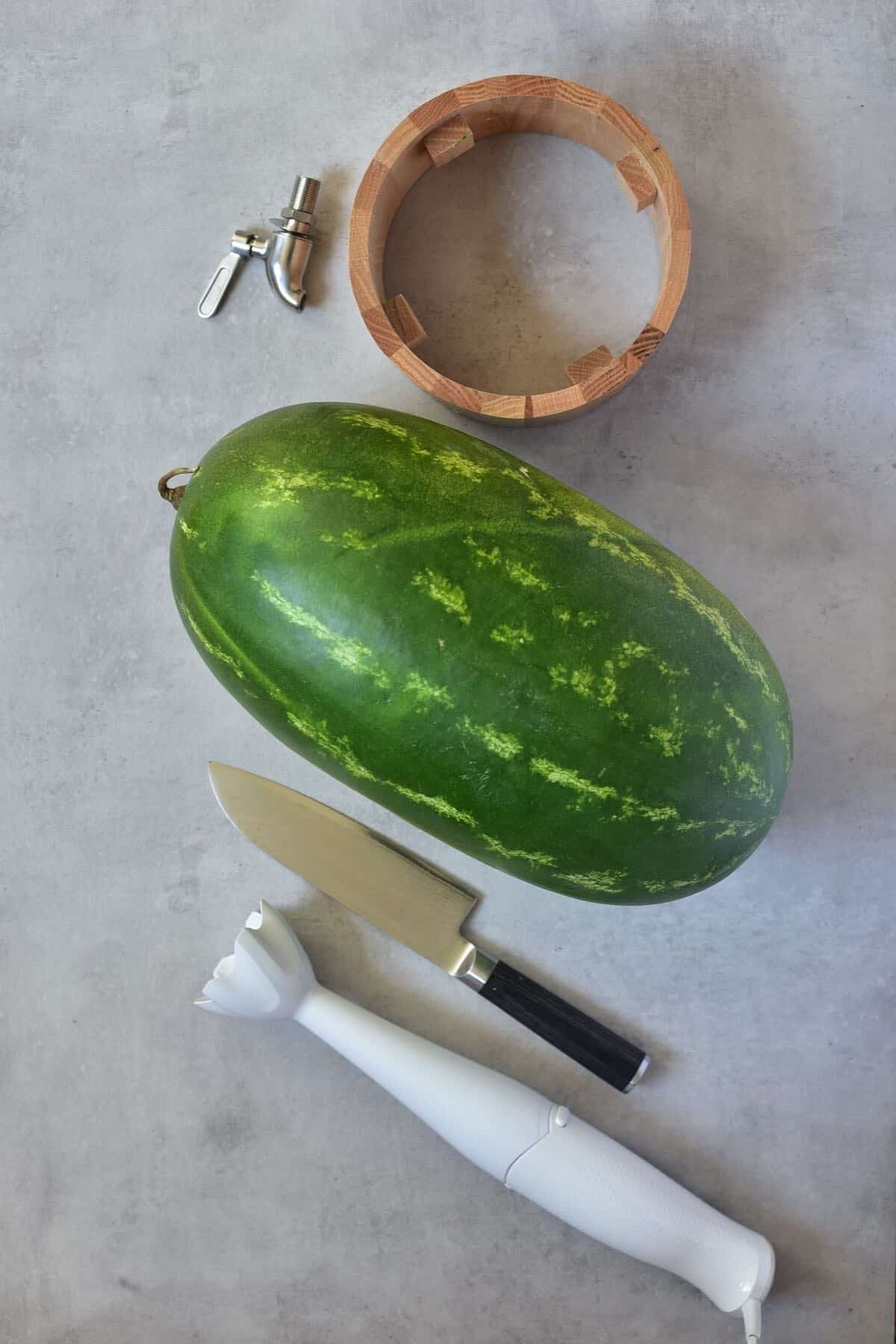 The tools needed for watermelon keg