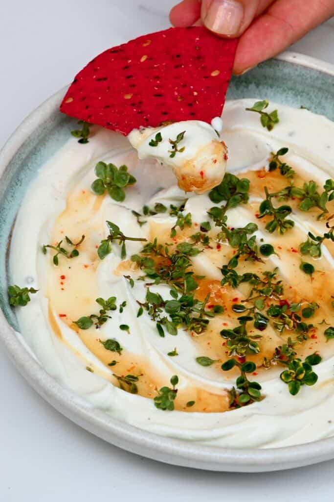 Whipped cheese topped with chili honey and thyme
