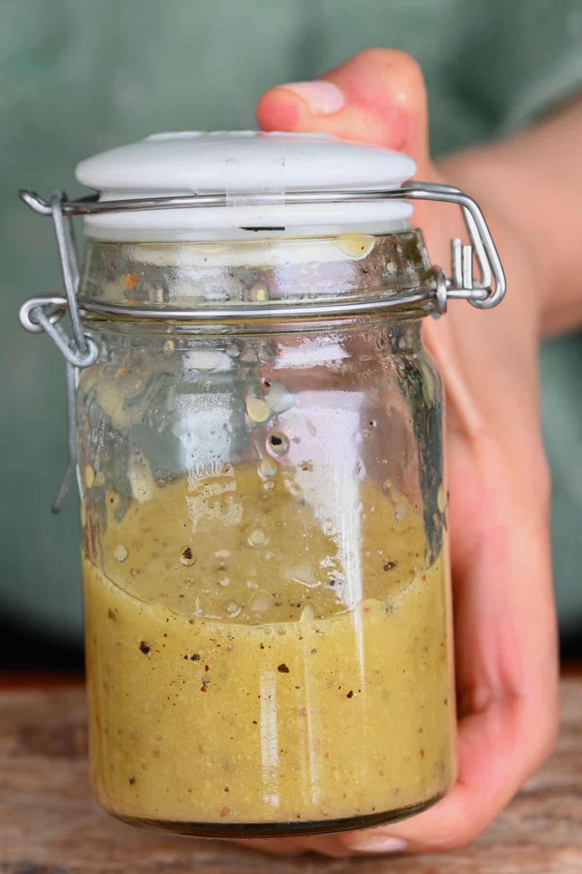 Mixed salad dressing in a small jar