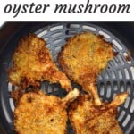 Four crispy oyster mushrooms in an air fryer basket