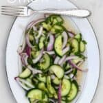 Cucumber onion salad served on a plate