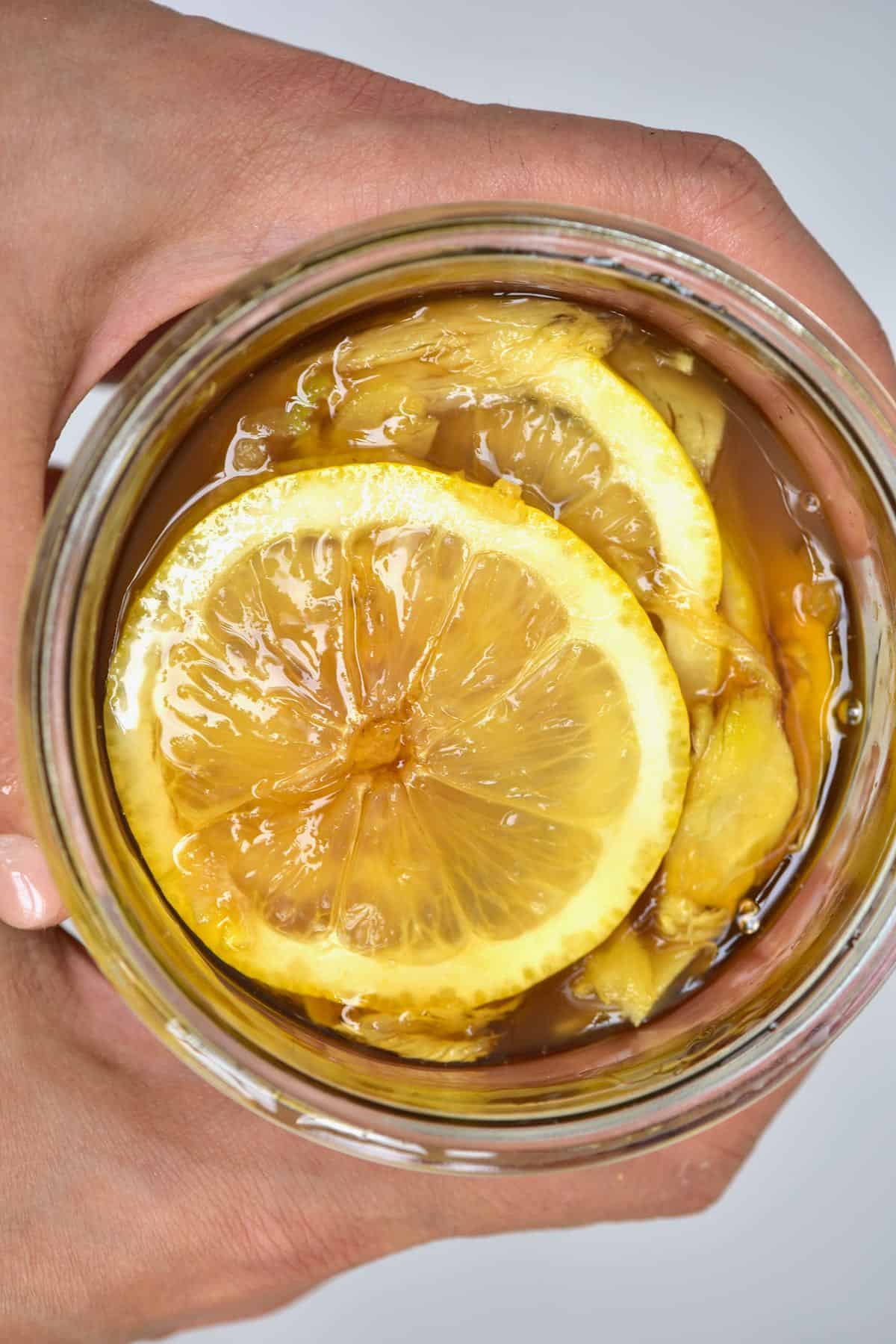 Lemon ginger honey ferment in a jar