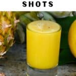 A shot glass with pineapple ginger juice