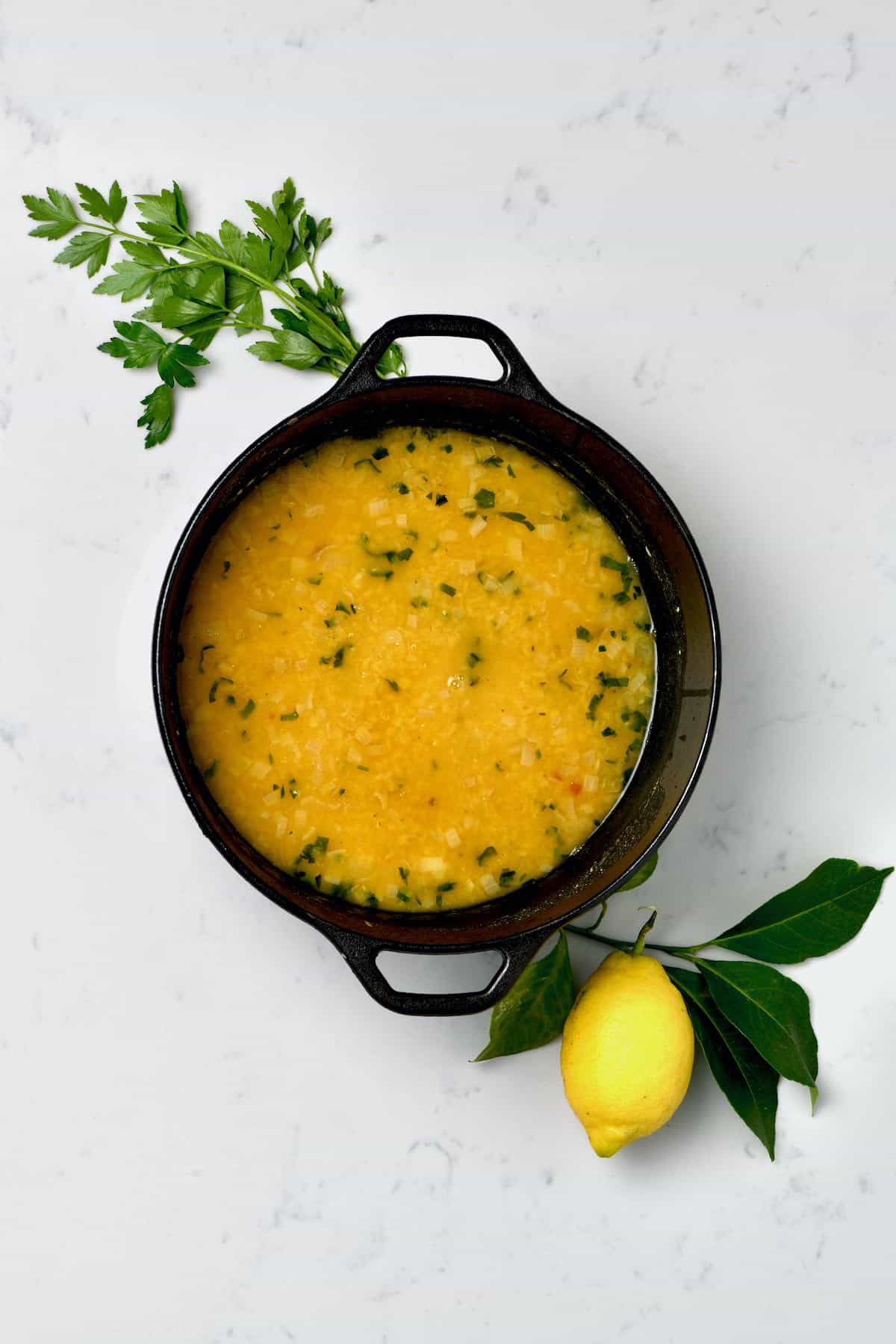 A large saucepan with red lentil soup