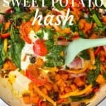 Sweet potato hash with eggs in a pan