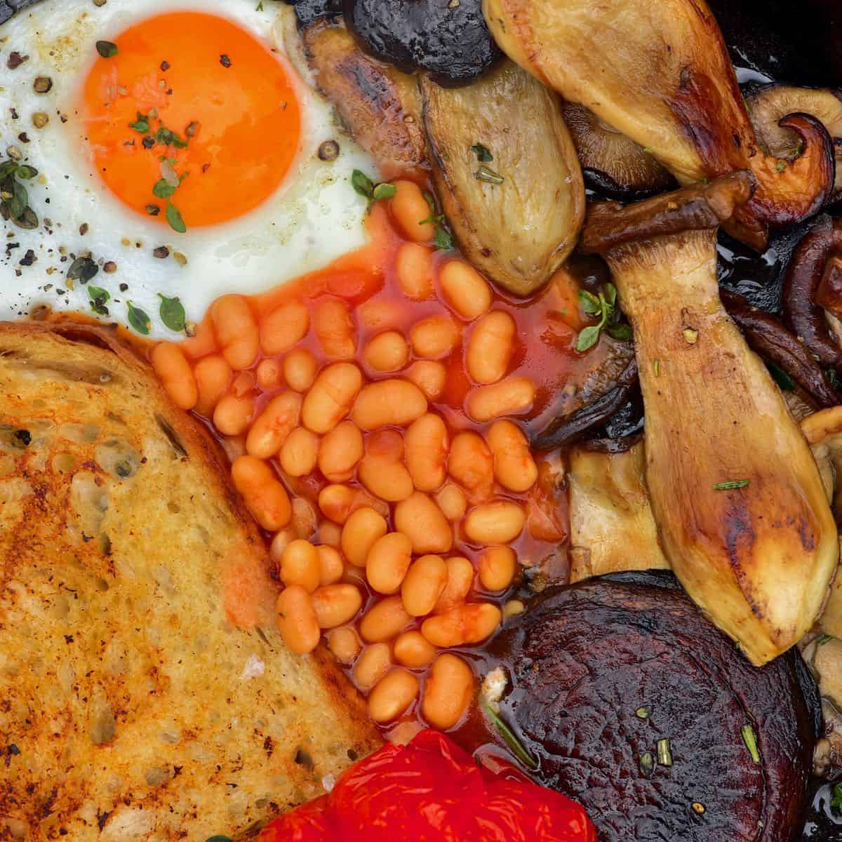 English breakfast with eggs beans mushrooms