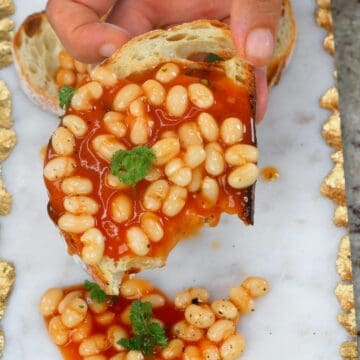 Homemade baked beans over toast