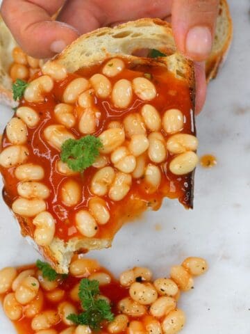 Homemade baked beans over toast