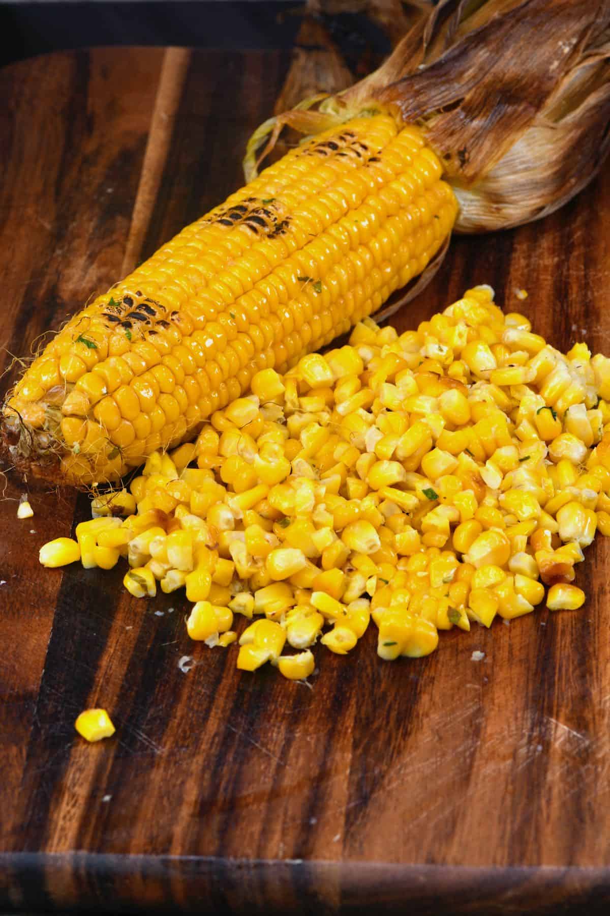 Oven-roasted corn on a cutting board