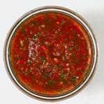 A jar with roasted tomato salsa