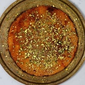 Homemade cheese kunafa topped with pistachios