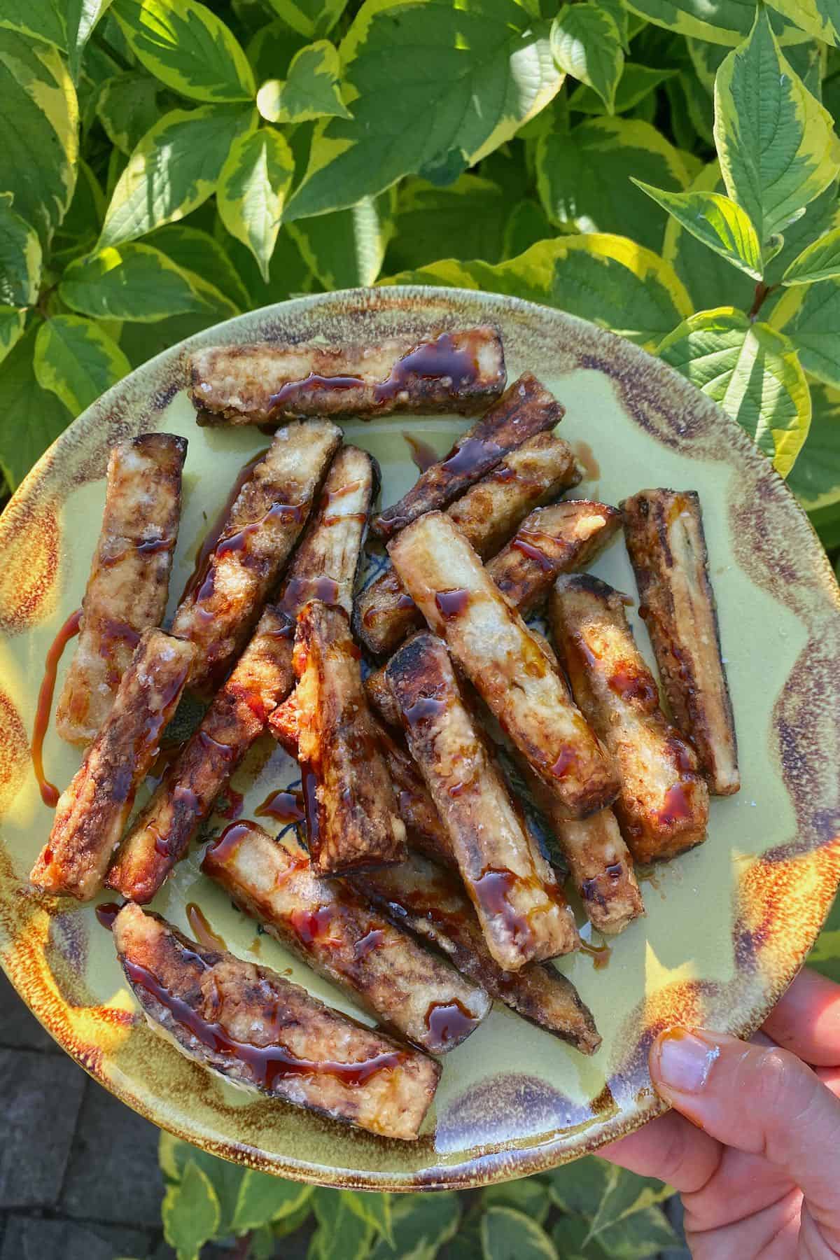 Eggplant fries drizzled with black honey