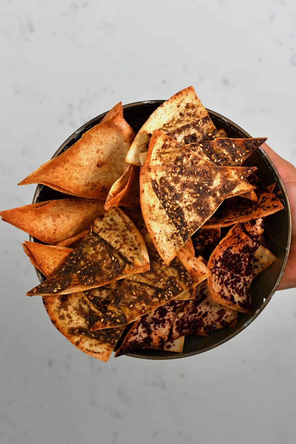 A bowl with homemade pita chips