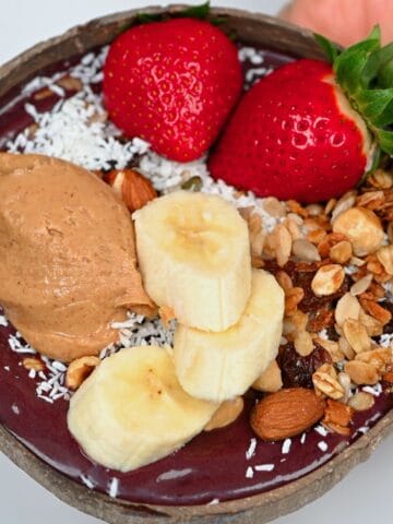 Acai bowl topped with banana and strawberries