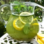 A pitcher with mint lemonade