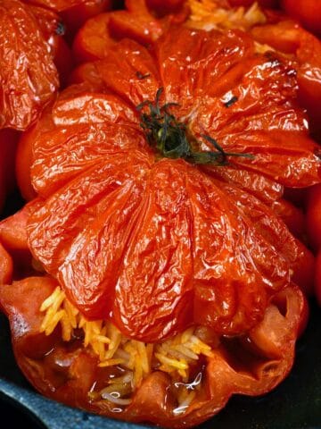 Stuffed tomatoes cooked in a pan