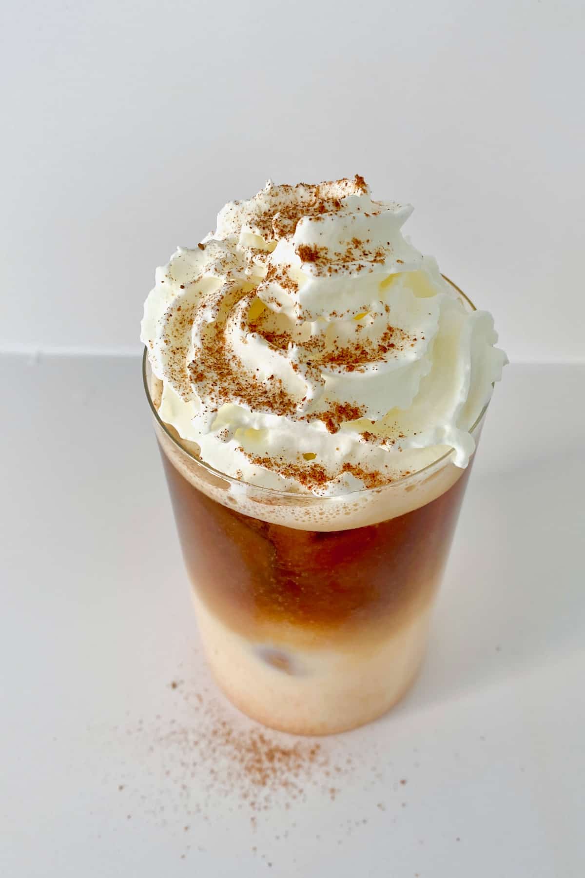 Iced pumpkin spice latte with whipped cream