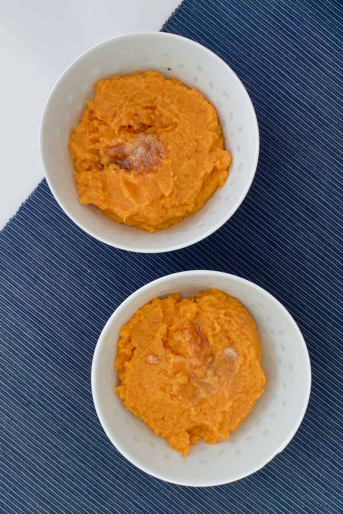 Two bowls with sweet potato puree