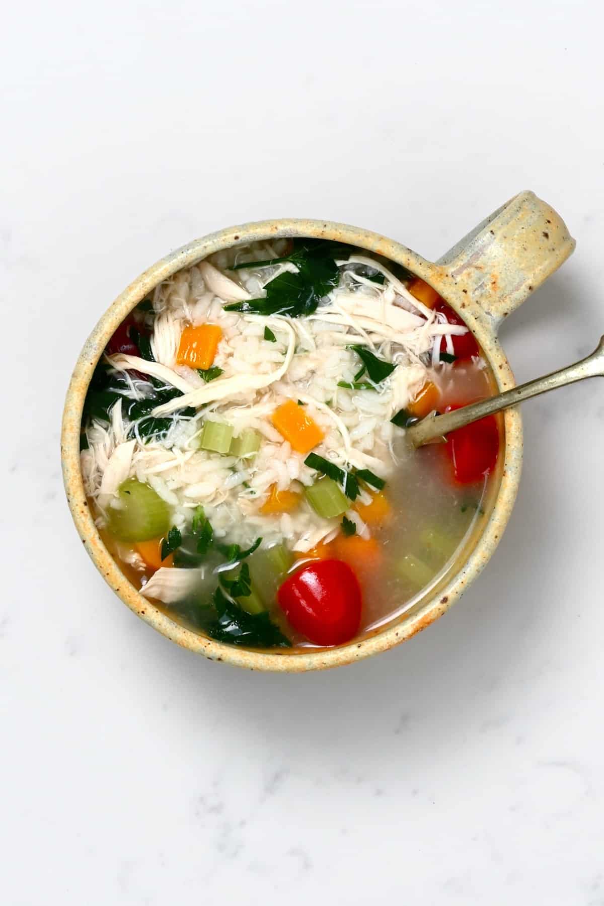 A bowl with chicken soup
