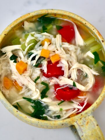 A bowl with chicken soup