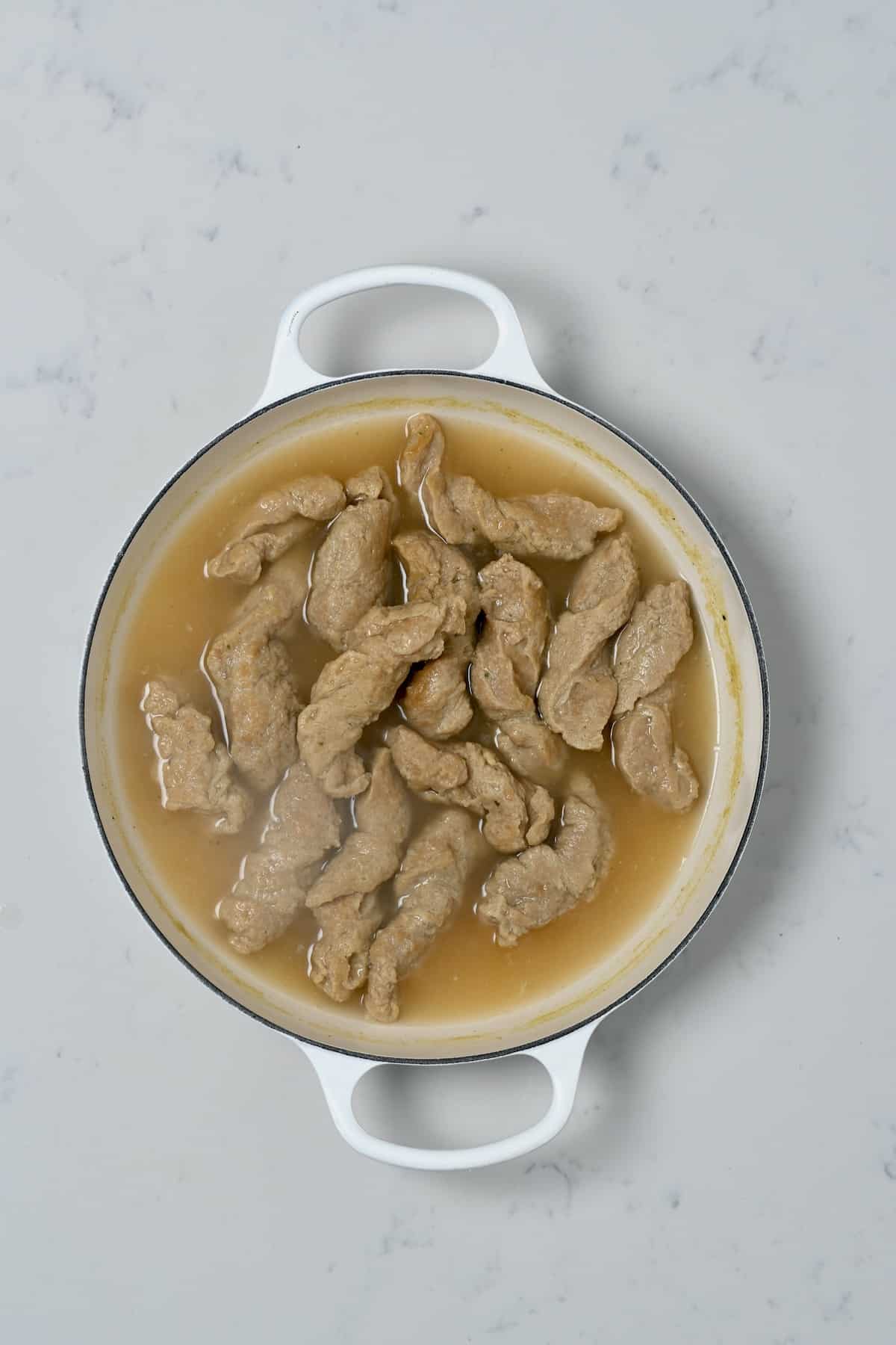 Boiled seitan in a pan